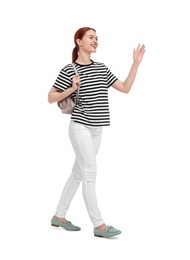 Happy woman with backpack on white background