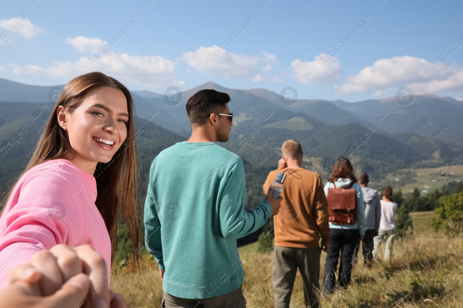 Photo of Group of people spending time together in mountains