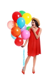 Emotional young woman holding bunch of colorful balloons on white background