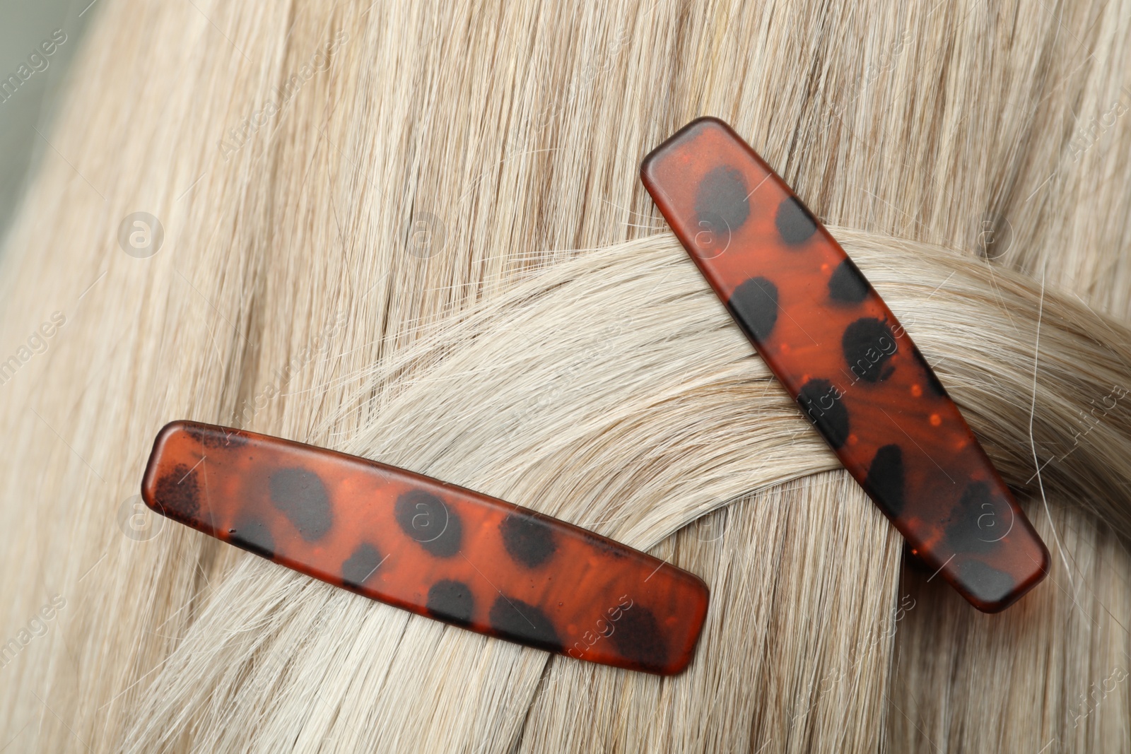 Photo of Woman with beautiful hair clips, closeup view