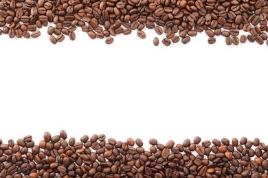 Photo of Many roasted coffee beans isolated on white , top view