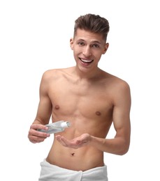 Photo of Handsome man with lotion on white background