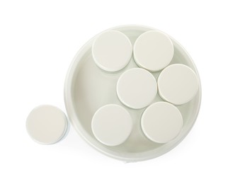 Photo of Modern yogurt maker with jars on white background, top view