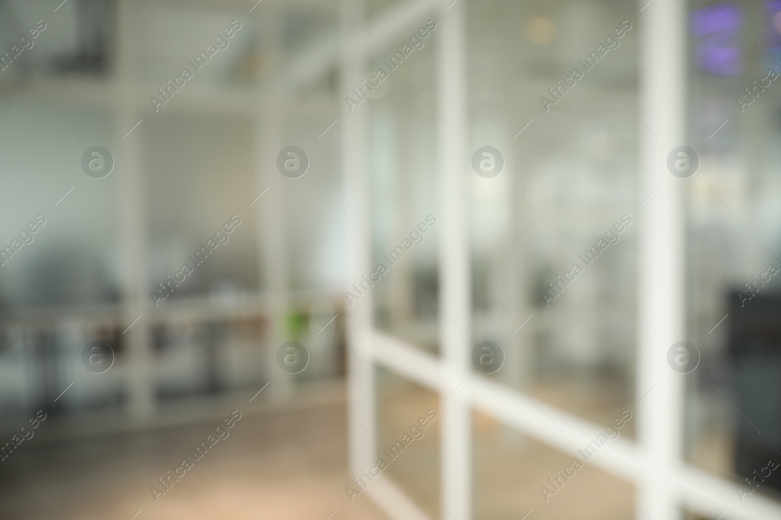 Photo of Blurred view of empty corridor in company