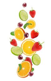 Image of Set of different cut fresh fruits and berries falling on white background