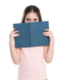 Photo of Cute little girl hiding behind book on white background. Reading activity