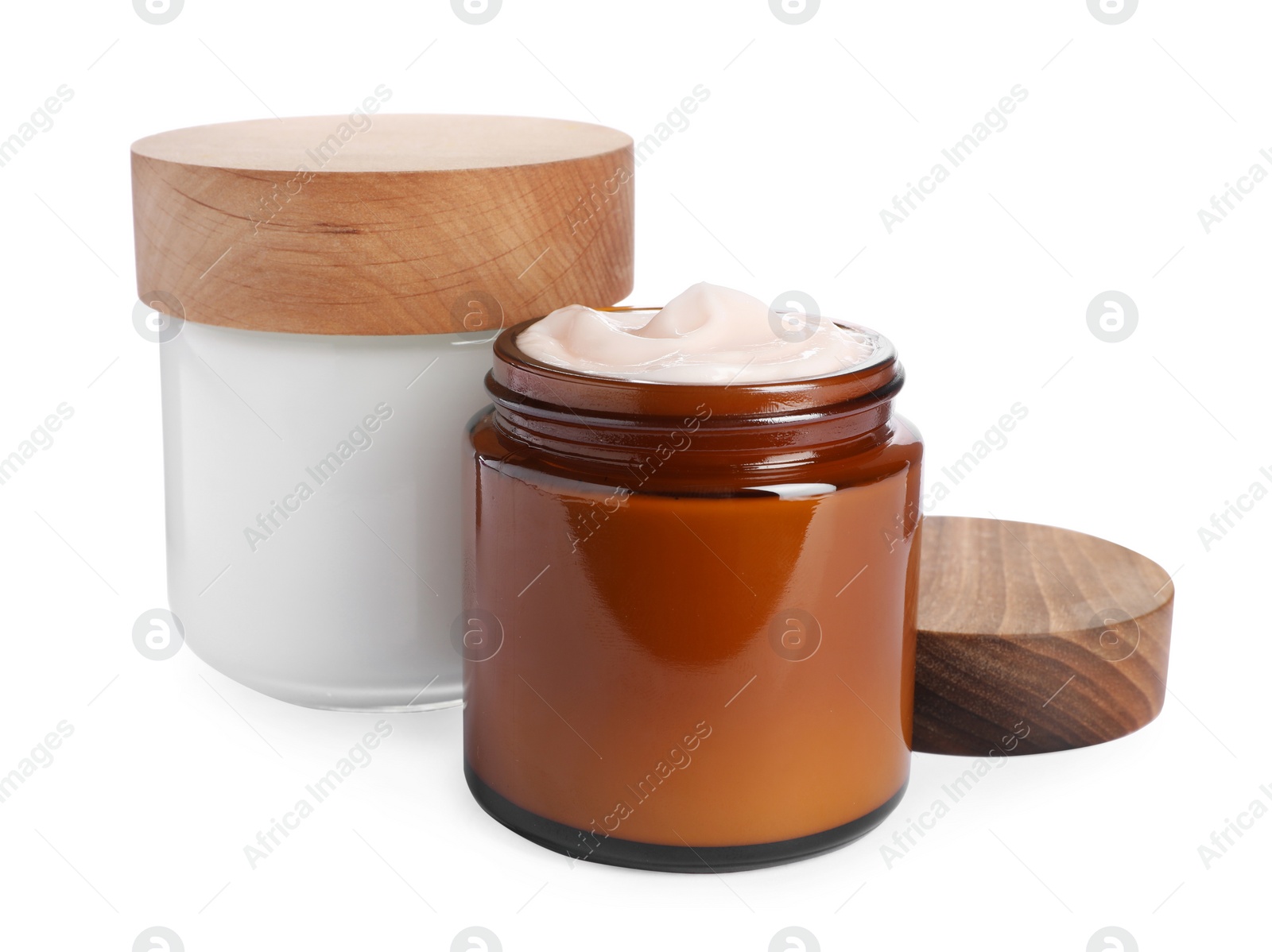 Photo of Jars of face cream isolated on white