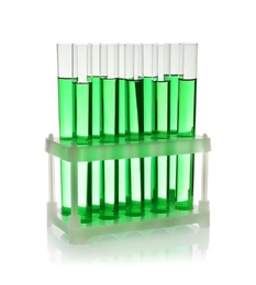 Test tubes with green liquid on white background