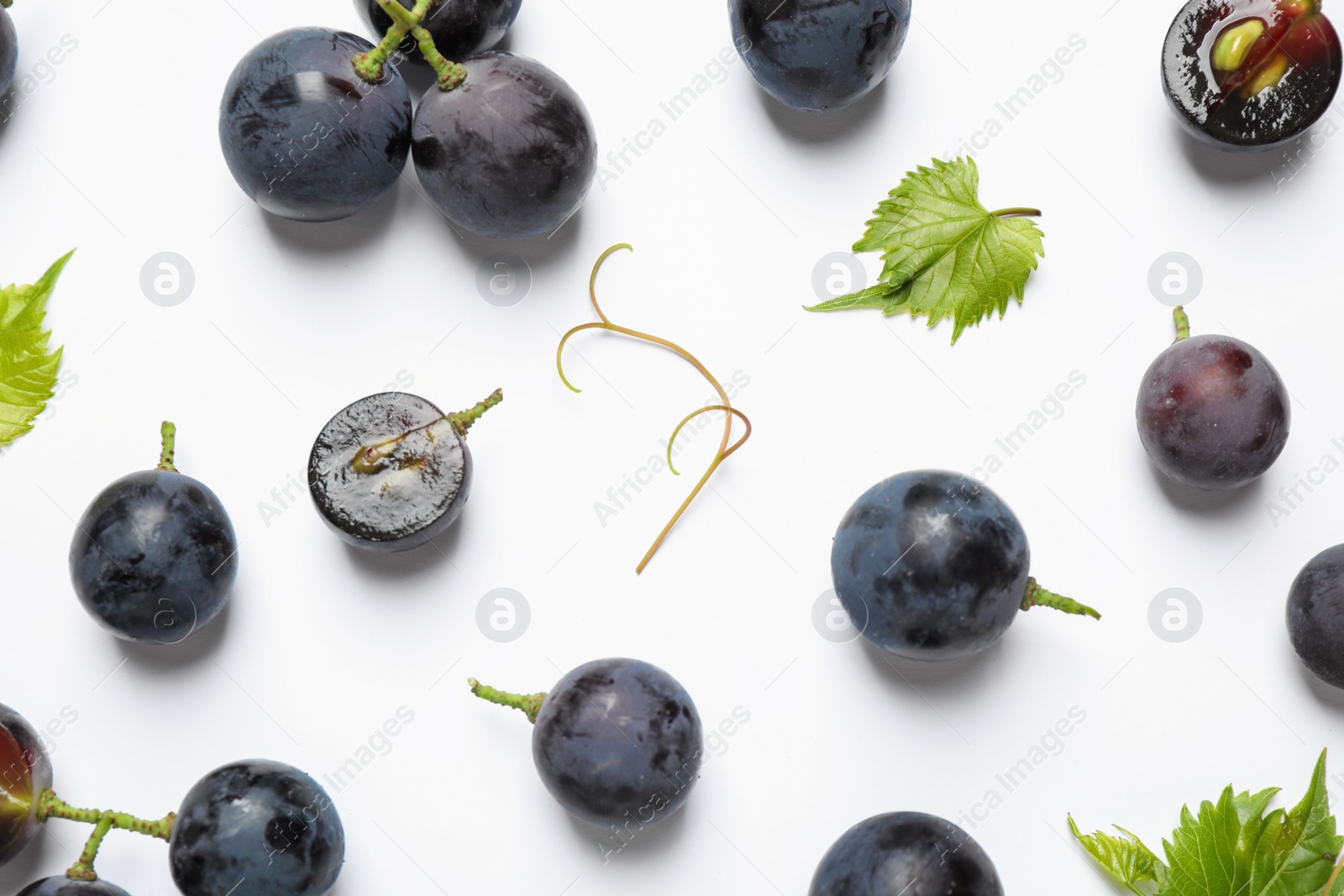 Photo of Fresh ripe juicy grapes on white background, top view