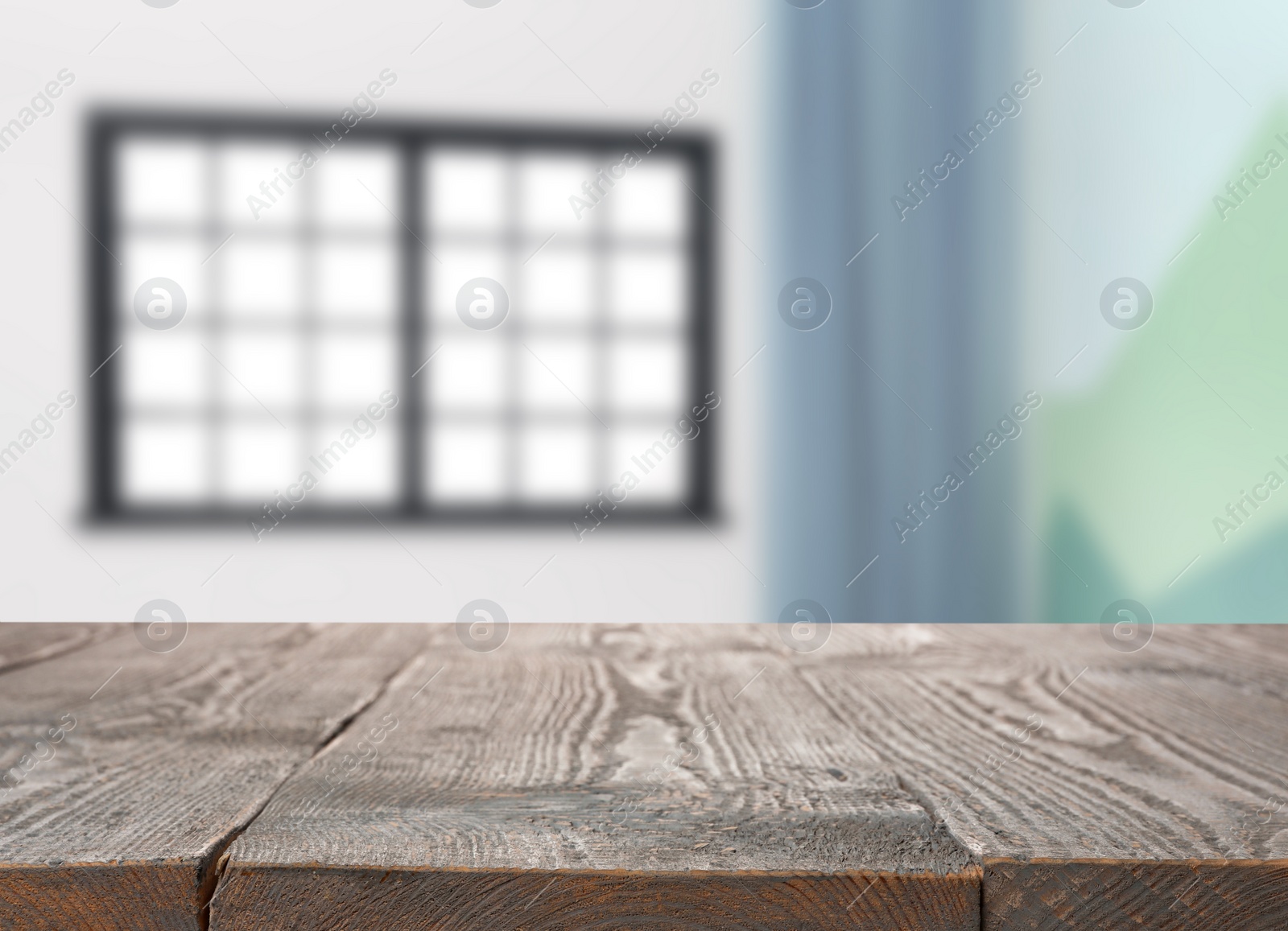 Image of Empty wooden surface and blurred view of modern window 