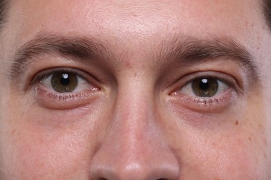 Closeup view of man with beautiful eyes
