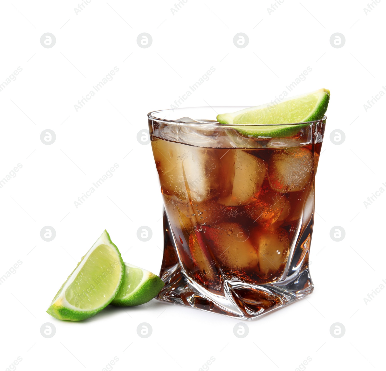 Photo of Glass of cocktail with cola, ice and cut lime on white background