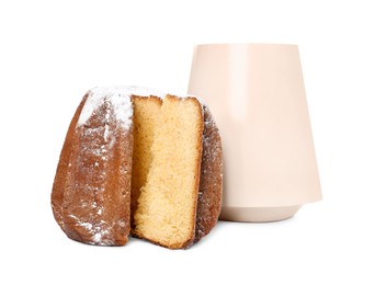Photo of Delicious Pandoro cake decorated with powdered sugar and box isolated on white. Traditional Italian pastry