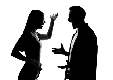 Photo of Silhouettes of couple quarreling on white background. Relationship problems