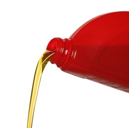 Photo of Pouring motor oil from red container isolated on white