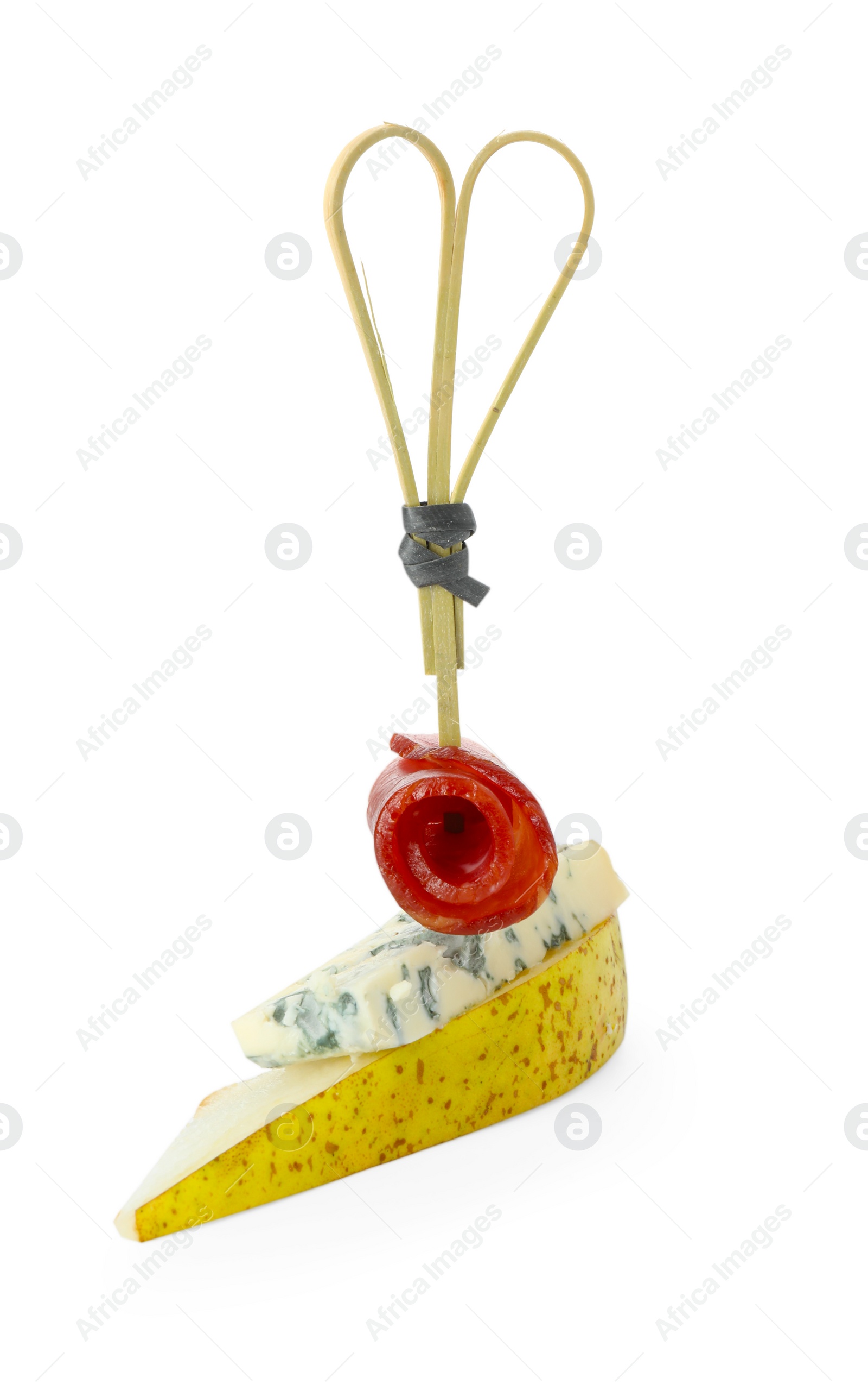 Photo of Tasty canape with pear, blue cheese and prosciutto isolated on white
