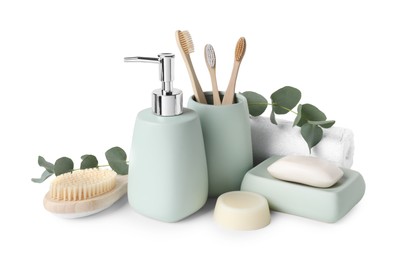 Photo of Bath accessories. Different personal care products and eucalyptus branches isolated on white