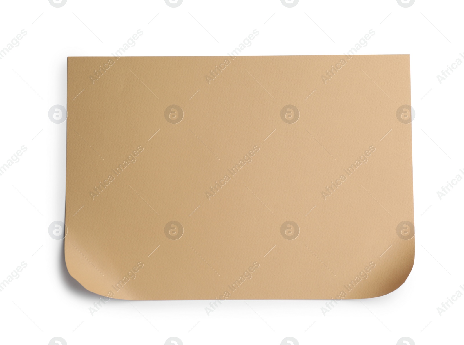 Photo of Sheet of brown paper on white background, top view