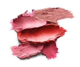 Photo of Collection of lipstick swatches on white background, top view