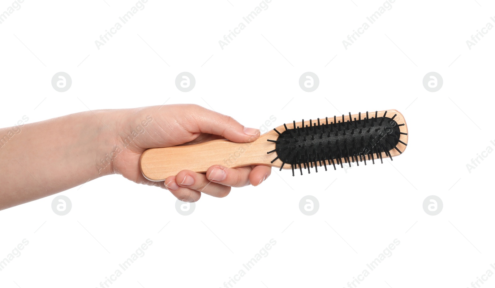 Photo of Woman holding hair brush on white background, closeup