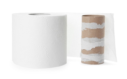 Full and empty toilet paper rolls on white background