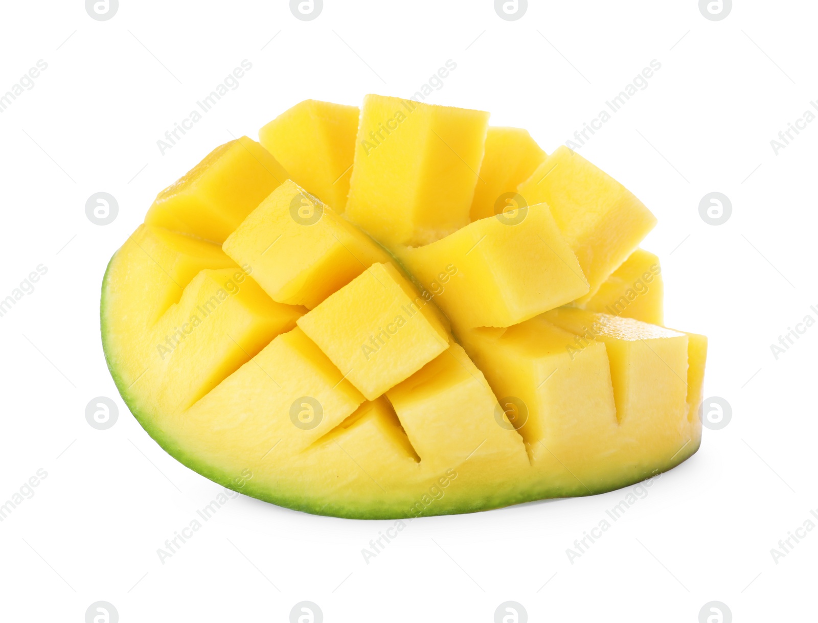 Photo of Half of ripe mango cut into cubes isolated on white