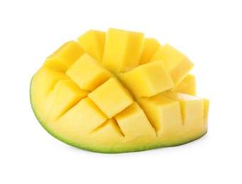 Half of ripe mango cut into cubes isolated on white