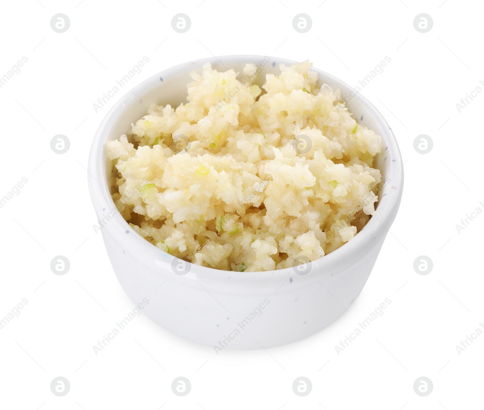 Photo of Chopped garlic in bowl isolated on white