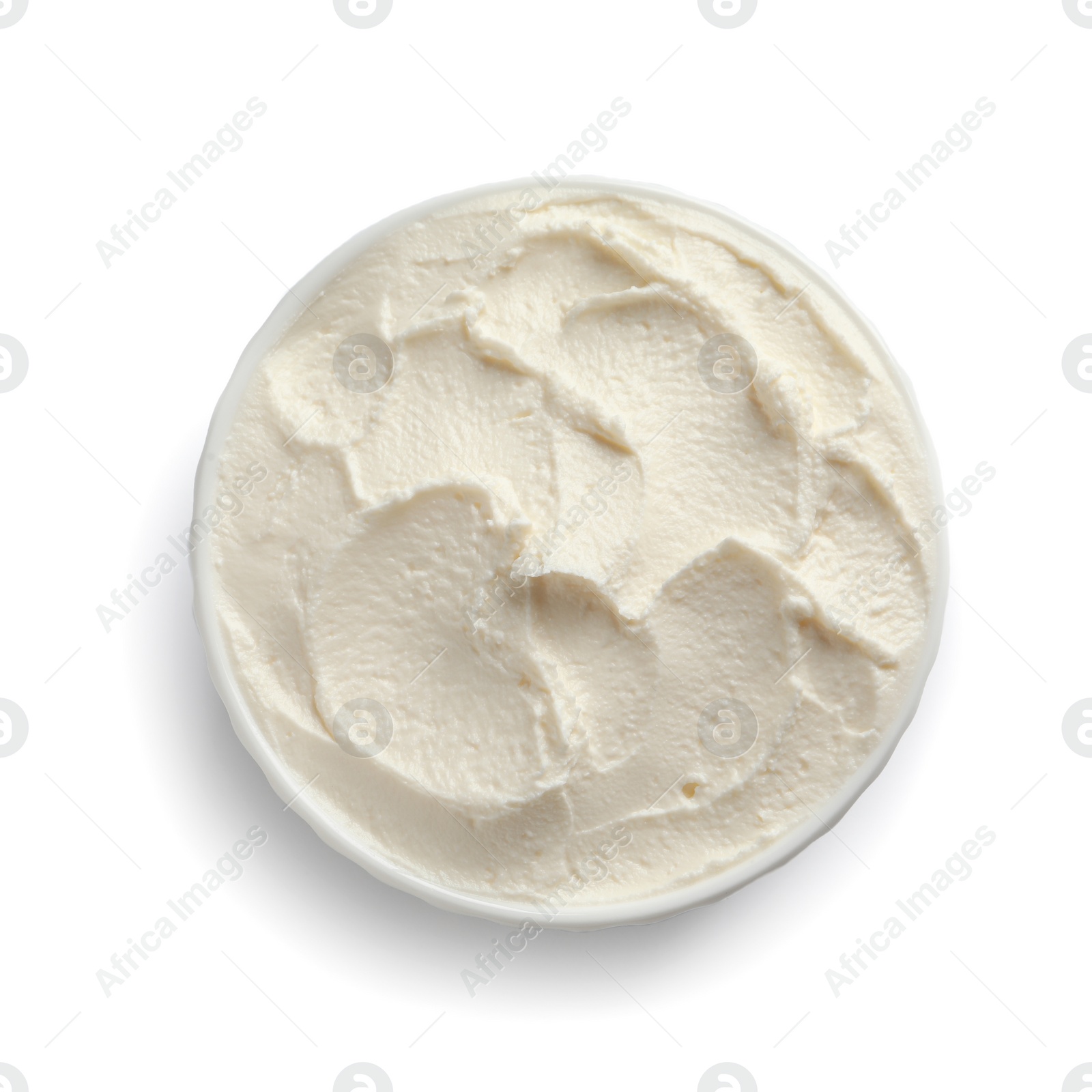 Photo of Bowl of tasty cream cheese on white background, top view