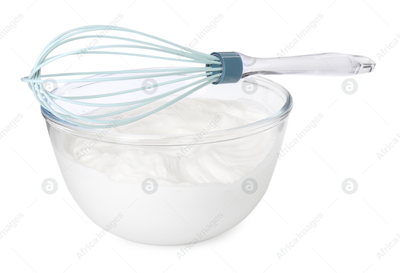 Photo of Bowl with whipped cream and whisk isolated on white