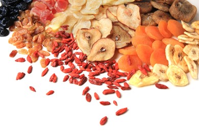 Pile of different tasty dried fruits on white background