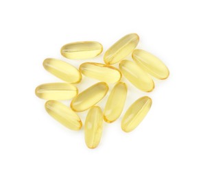 Photo of Vitamin capsules isolated on white, top view. Health supplement