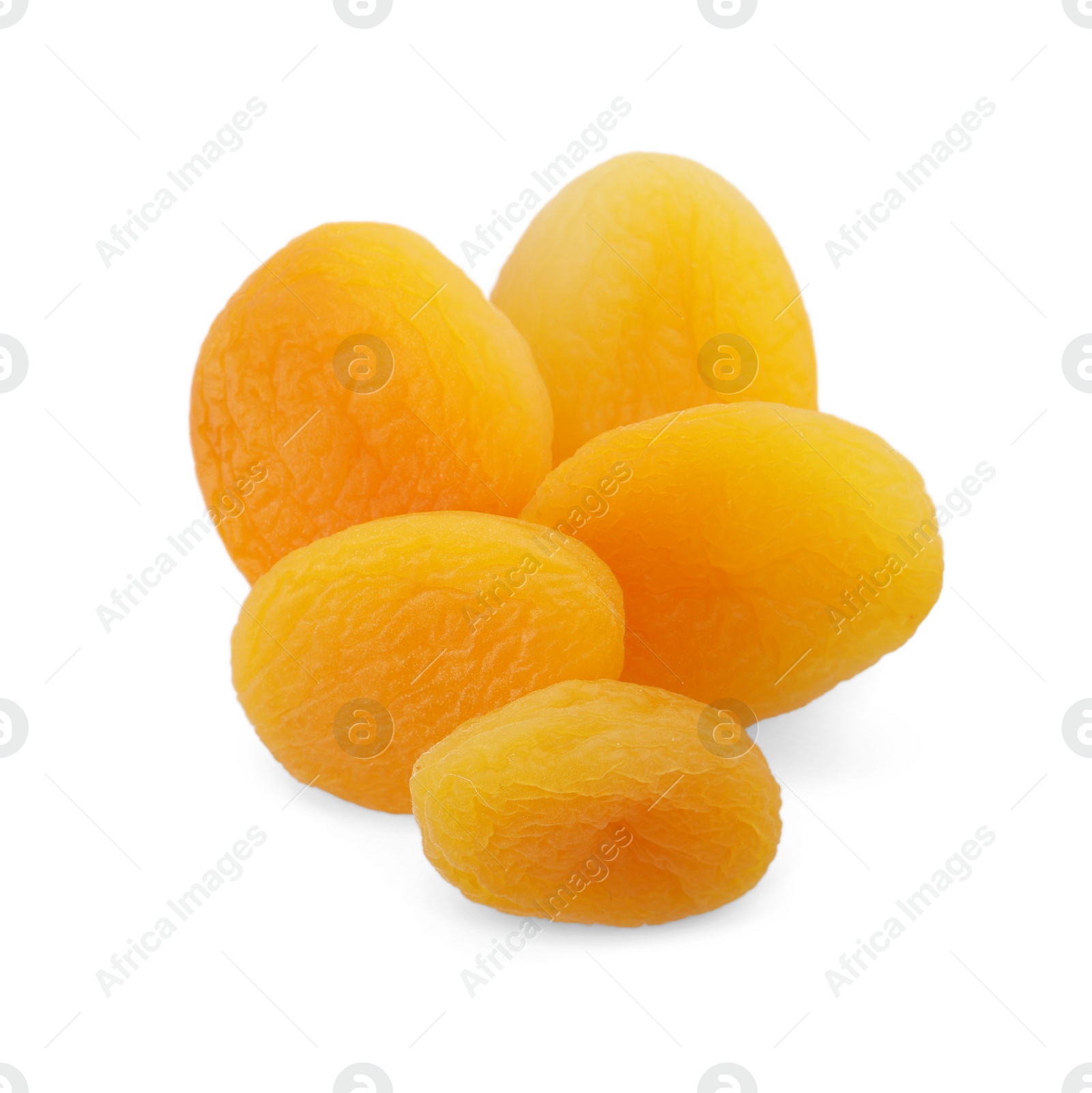 Photo of Pile of tasty apricots on white background, top view. Dried fruits