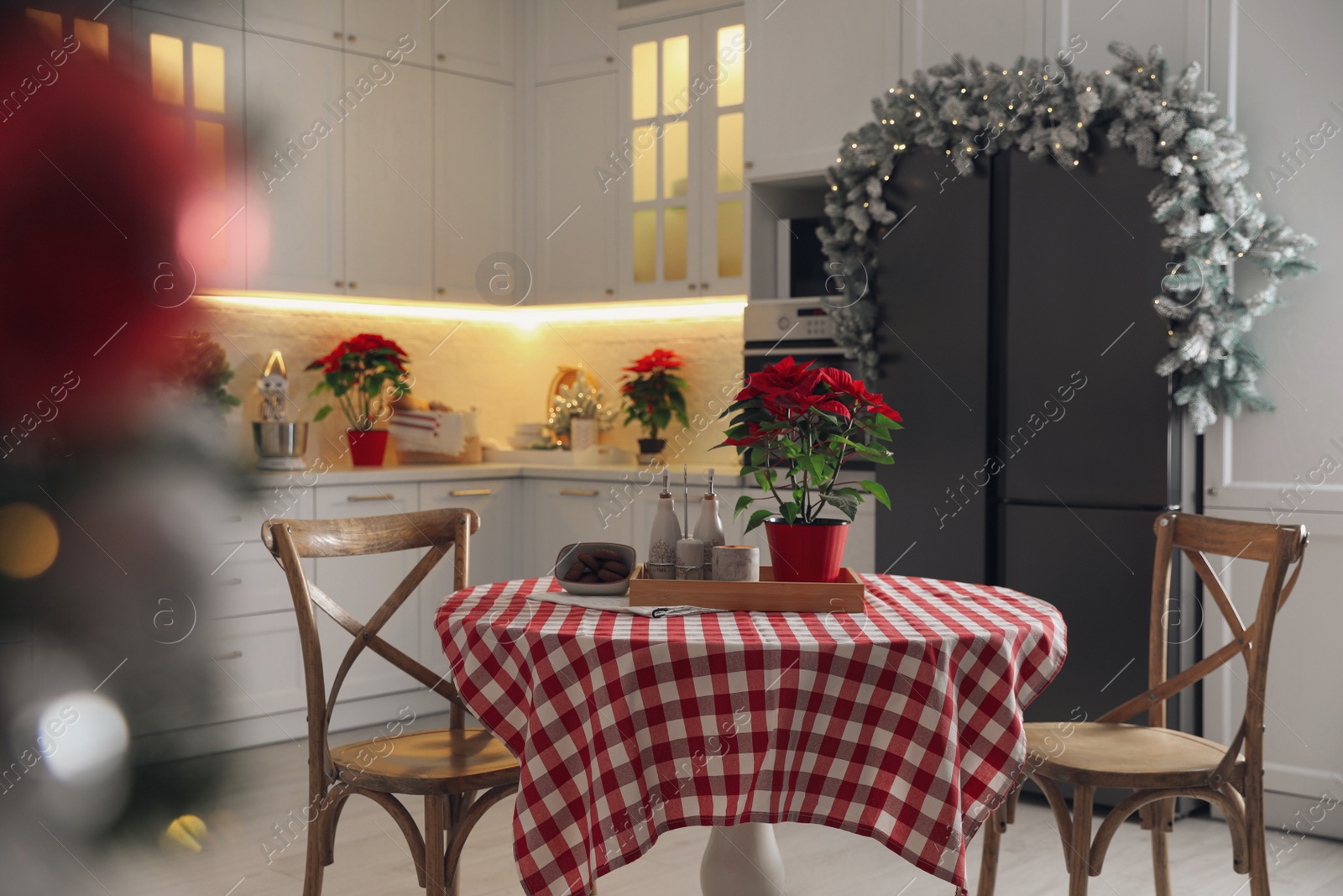 Photo of Beautiful kitchen interior with stylish Christmas decor