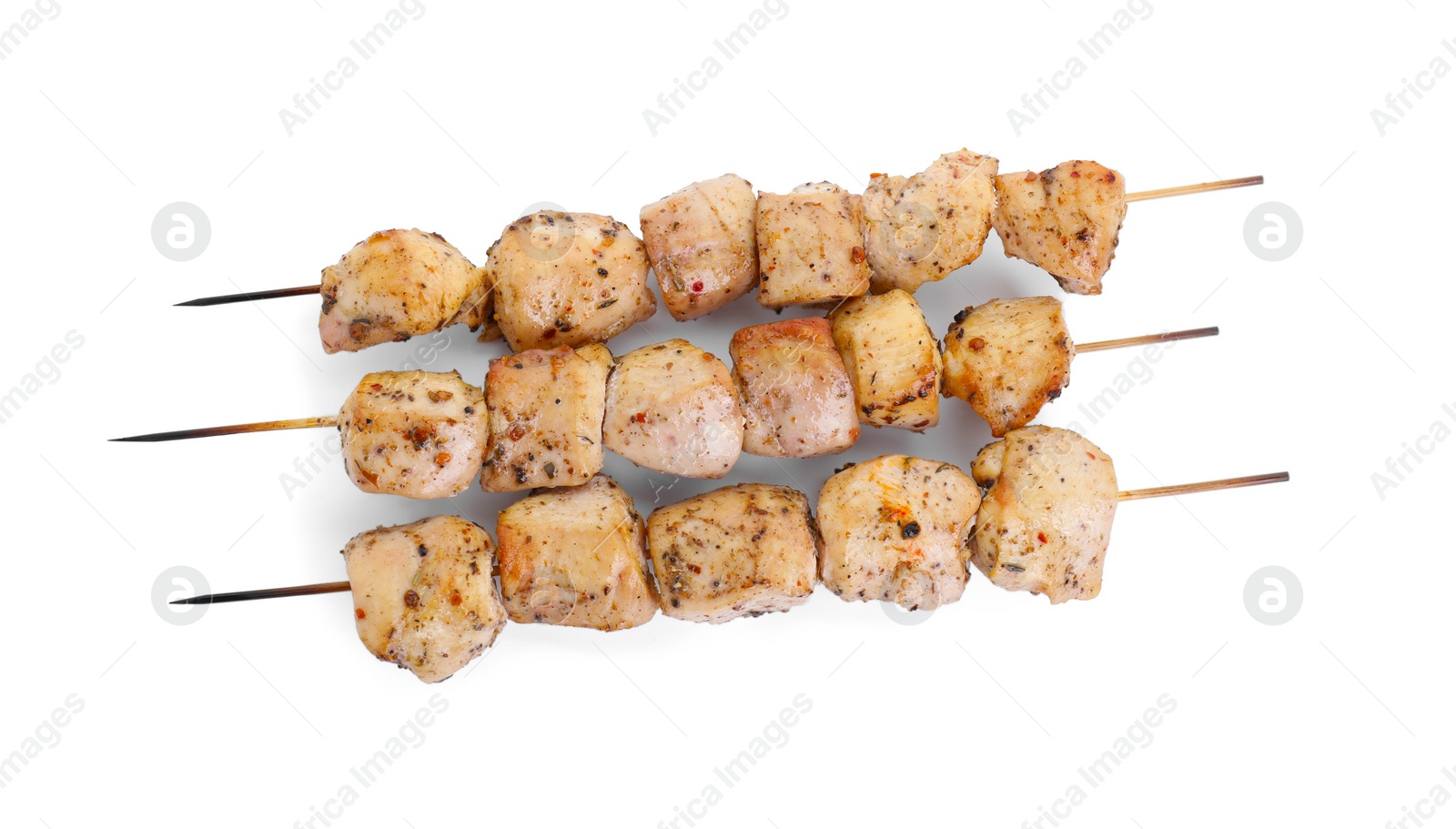 Photo of Delicious shish kebabs isolated on white, top view