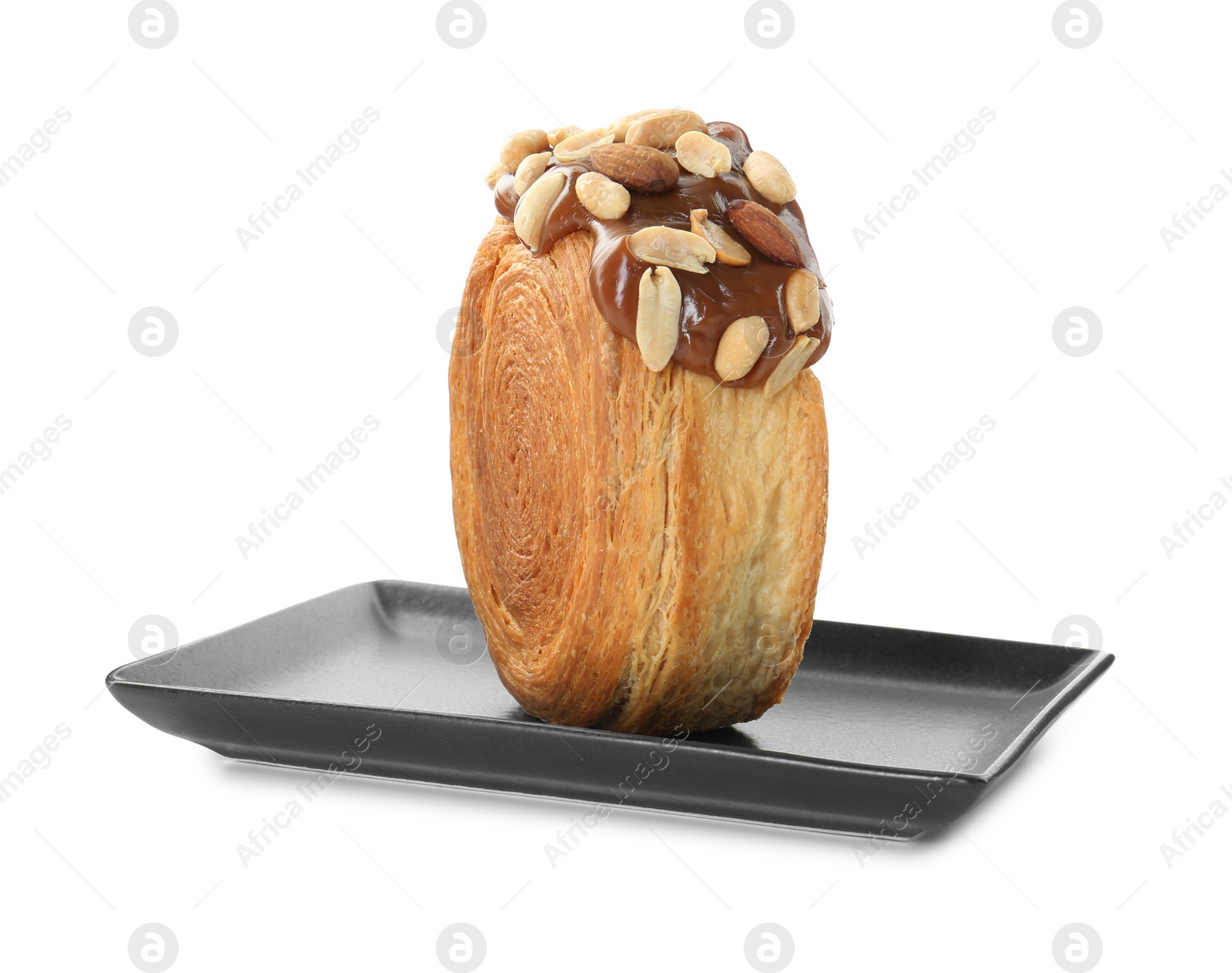 Photo of Round croissant with chocolate paste and nuts isolated on white. Tasty puff pastry