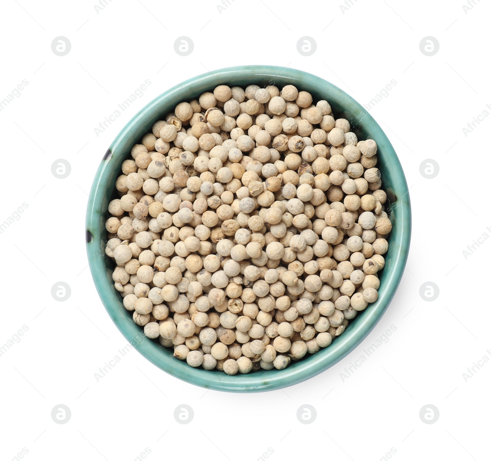 Photo of Aromatic spice. Many peppercorns in bowl isolated on white, top view