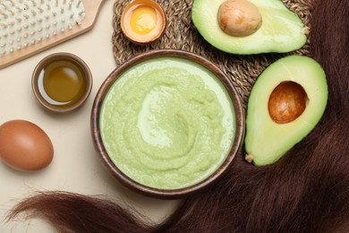 Photo of Flat lay composition with homemade hair mask and ingredients on beige background