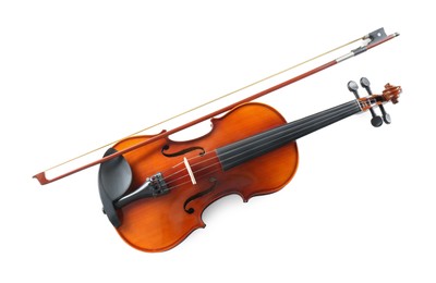 Photo of Beautiful violin with bow on white background, top view. Classic musical instrument