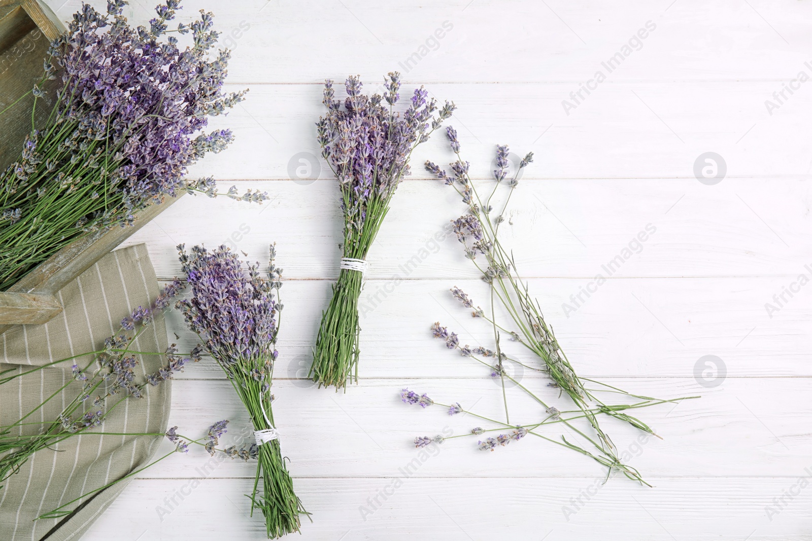 Photo of Flat lay composition with lavender flowers on wooden background