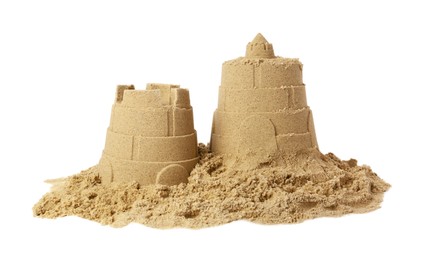 Pile of sand with beautiful castle isolated on white. Outdoor play