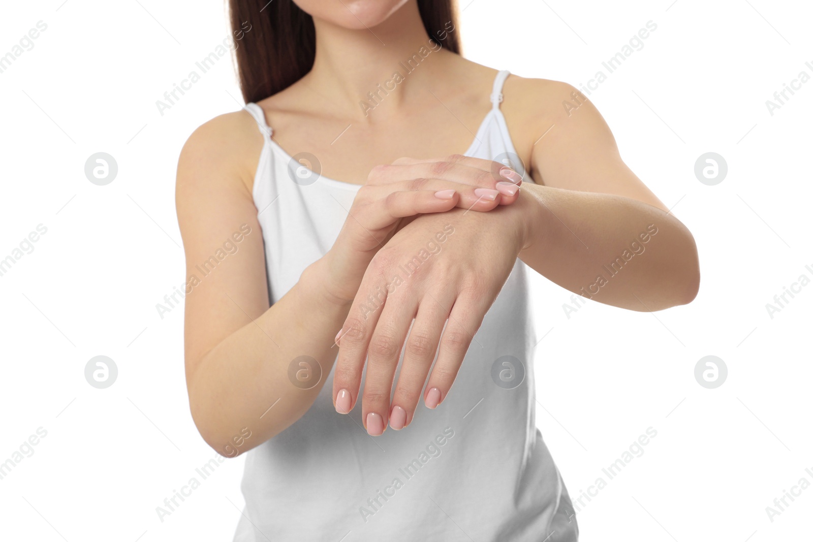 Photo of Woman suffering from pain in her hand on white background, closeup. Arthritis symptoms