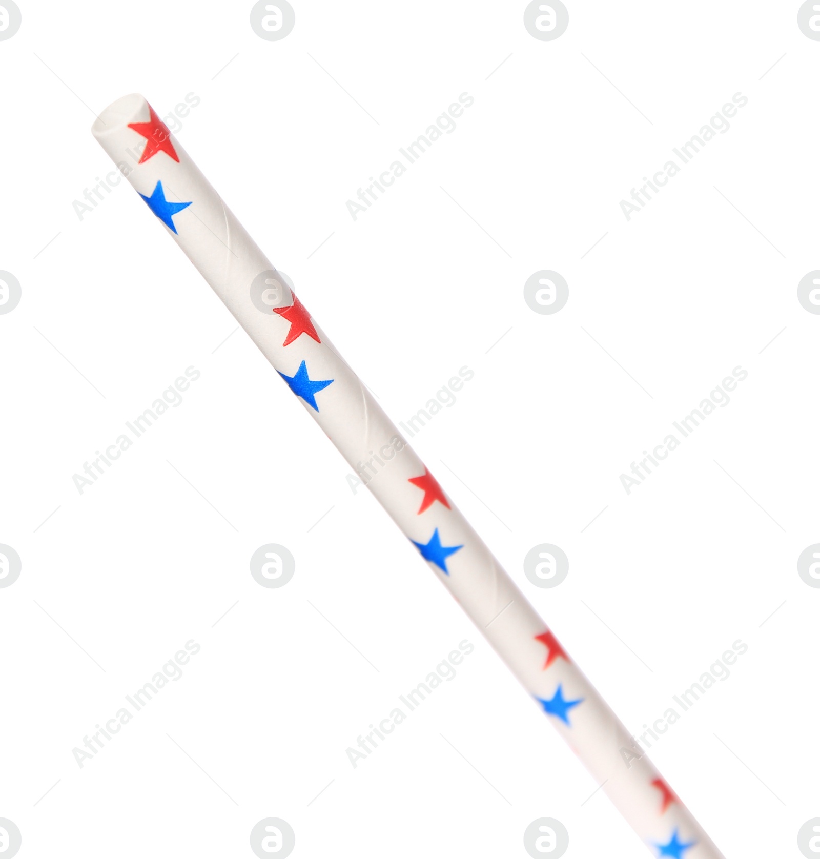 Photo of One paper straw with colorful stars for drinking isolated on white