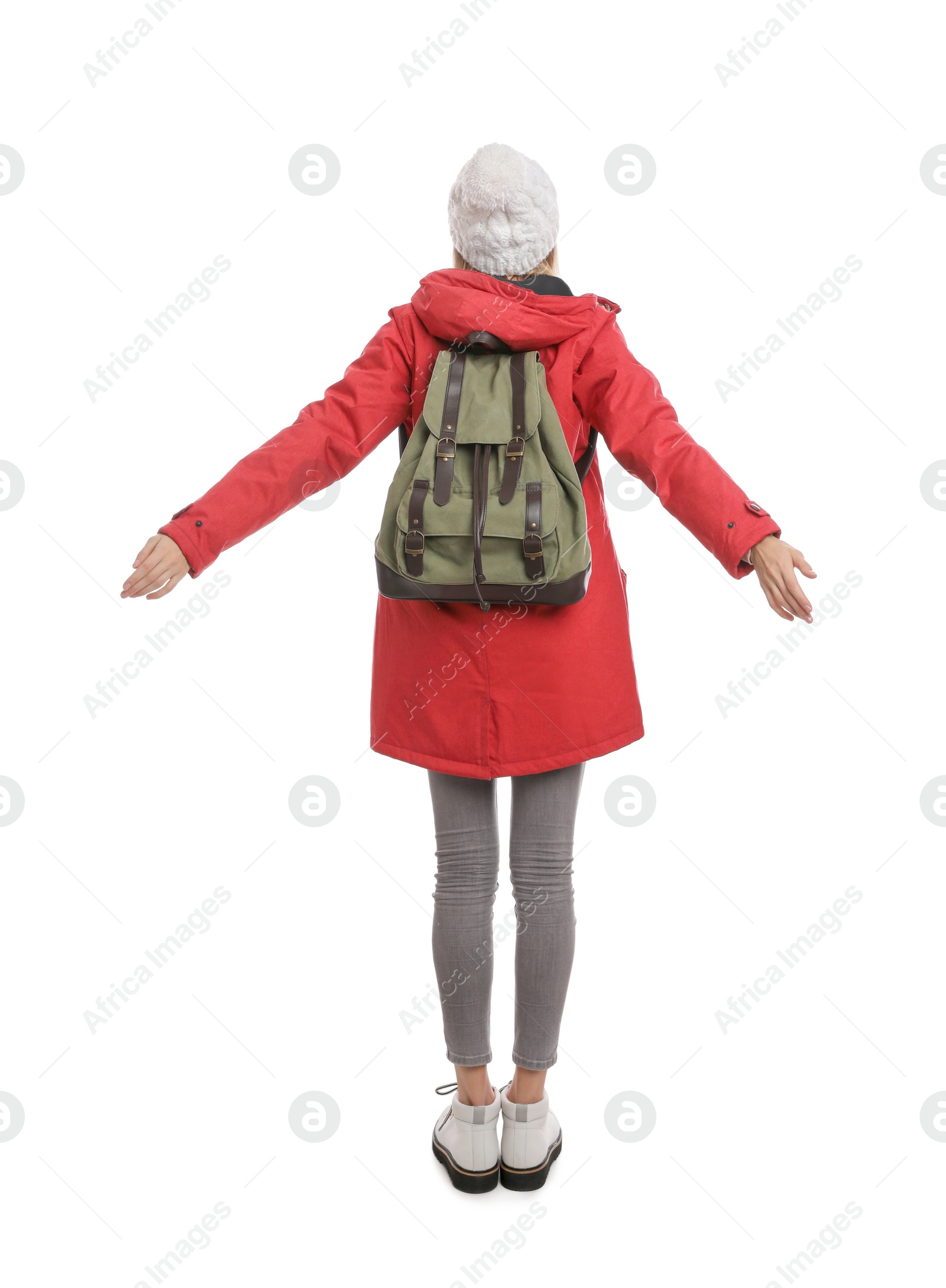 Photo of Woman with backpack on white background, back view. Winter travel