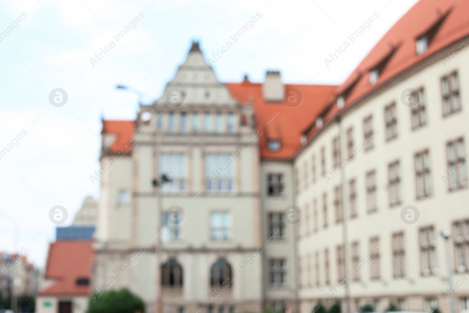 Photo of Blurred view of city street with beautiful building