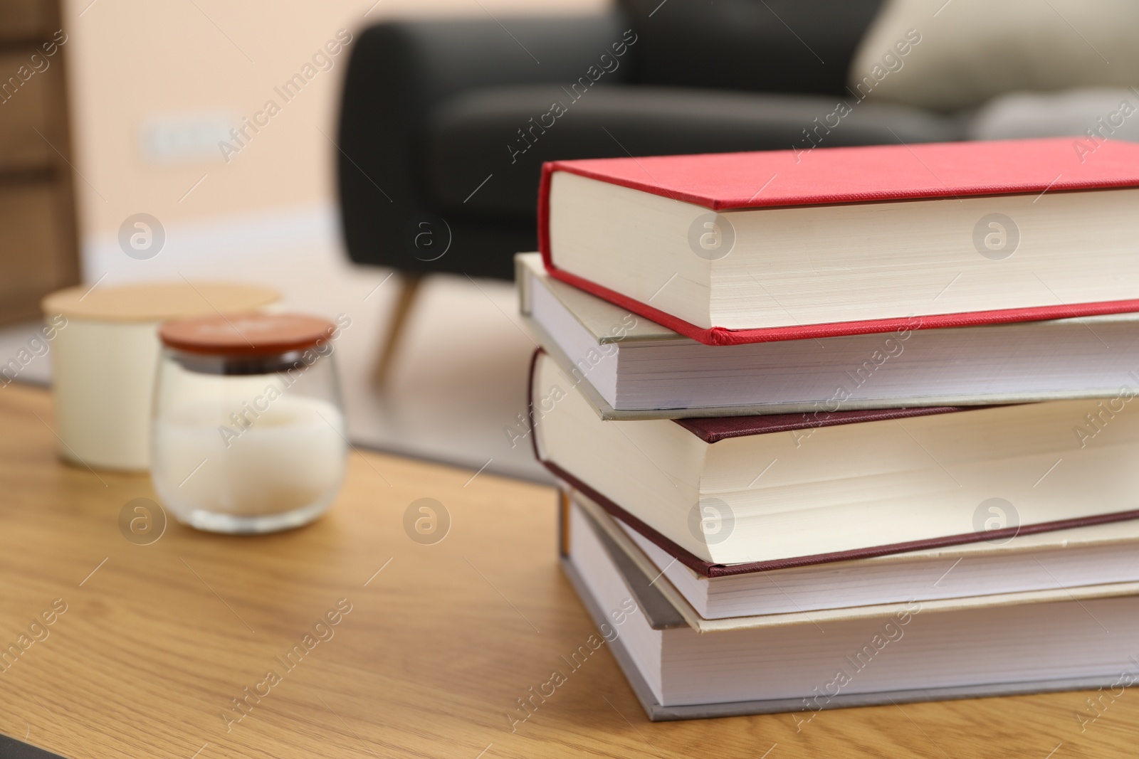 Photo of Books on wooden table indoors, space for text