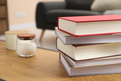 Photo of Books on wooden table indoors, space for text