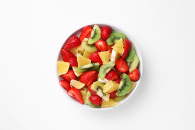 Photo of Yummy fruit salad in bowl on white background, top view