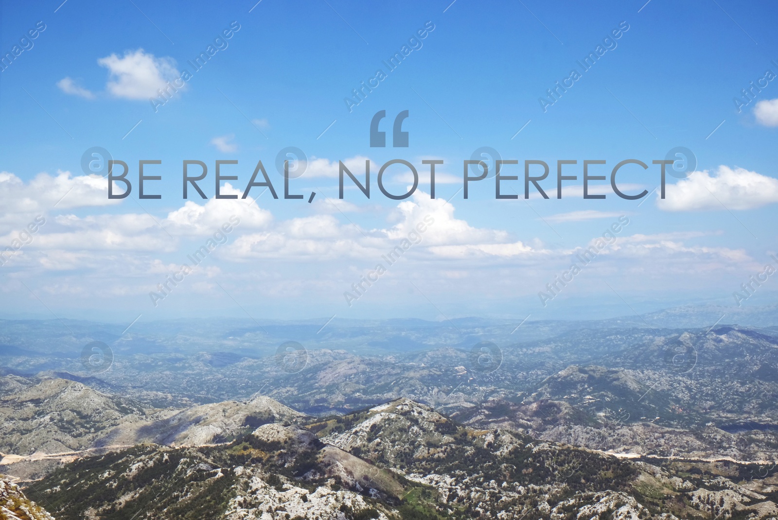 Image of Be Real, Not Perfect. Inspirational quote reminding that being sincere with yourself and others is harmonic way to live. Text against beautiful mountain landscape