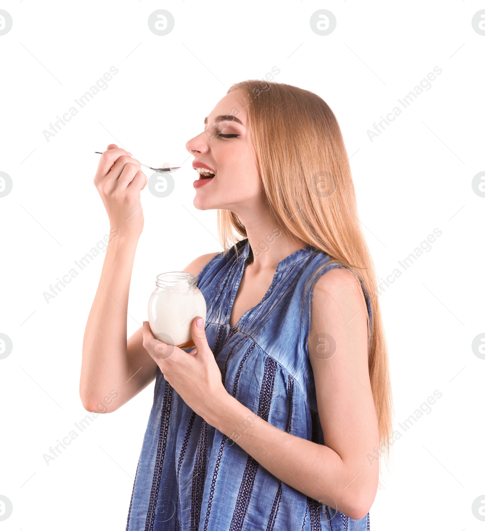 Photo of Young woman with yogurt on white background